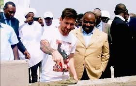 MESSI LAYING A STONE