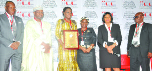 Mrs. Kemi Adeosun, Minister of Finance (3rd left) holding a plaque presented to her at the National Insurance Conference 2016, in Abuja, recently; to her right are Mohammed Kari, Commissioner for Insurance; and Mr. Eddie Efekoha, Chairman, Nigerian Insurers Association; to the Minister’s left are Mrs Yetunde Ilori, Chairman, National Insurance Conference Planning Committee; Lady Isioma Chukwuma, President, Chartered Insurance Institute of Nigeria; and Mr. Ralph Opara, President, Institute of Loss Adjusters of Nigeria