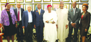 (L-R) Tinu Awe, General Counsel & Head Regulation, Nigerian Stock Exchange (NSE); Haruna Jalo-Waziri, Executive Director, Capital Markets Division, NSE; Sheik Abdul Moshen Rahman Al-Thunayan, Chairman, Medview Airline Plc; Oscar Onyema, CEO, NSE; Muneer Bankole, Managing Director/CEO, Medview Airline Plc; Minister of State for Aviation, Senator Hadi Sirika; Ade Bajomo, Executive Director, Market Operations and Technology, NSE and Pai Gamde, Acting Head, Corporate Services Division, NSE at Facts Behind the Listing of Medview Airline Plc