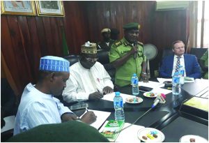 C-G National Park Service, Ibrahim M. Goni delivering the welcome address at the meeting & to his immediate right, the Honourable Minister of State for Environment, Alh. Ibrahim Usman Jibril